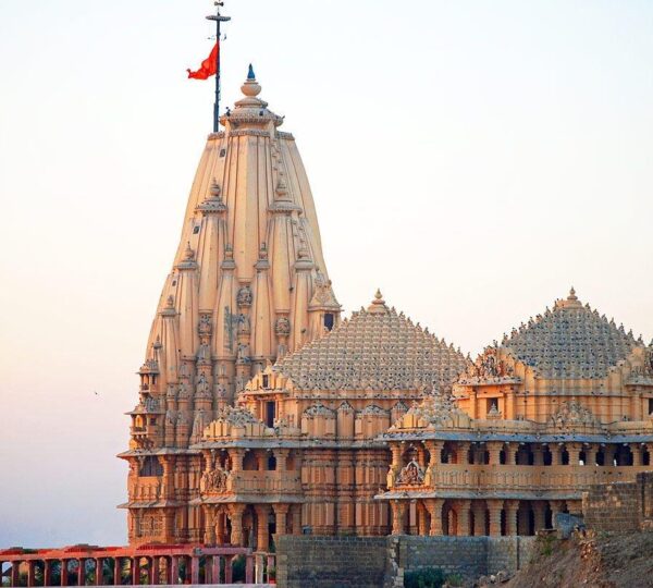 Dwarkadhish Temple in Gujarat is a revered Hindu Shrine dedicated to Lord Krishna. Its stunning architecture, spiritual ambience and historical significance attract pilgrims and tourists alike. Situated near the Arabian Sea, it offers a divine experience with breathtaking coastal views.